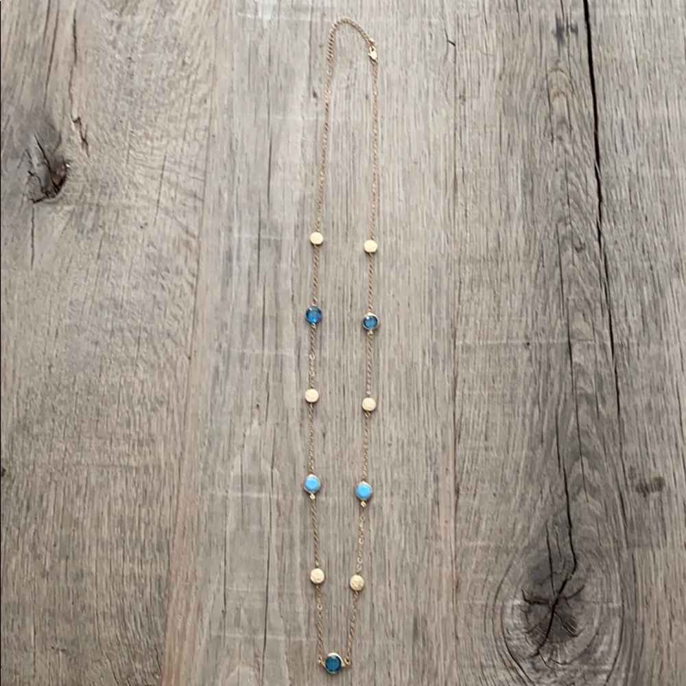 Gold long necklace with blue and gold disks